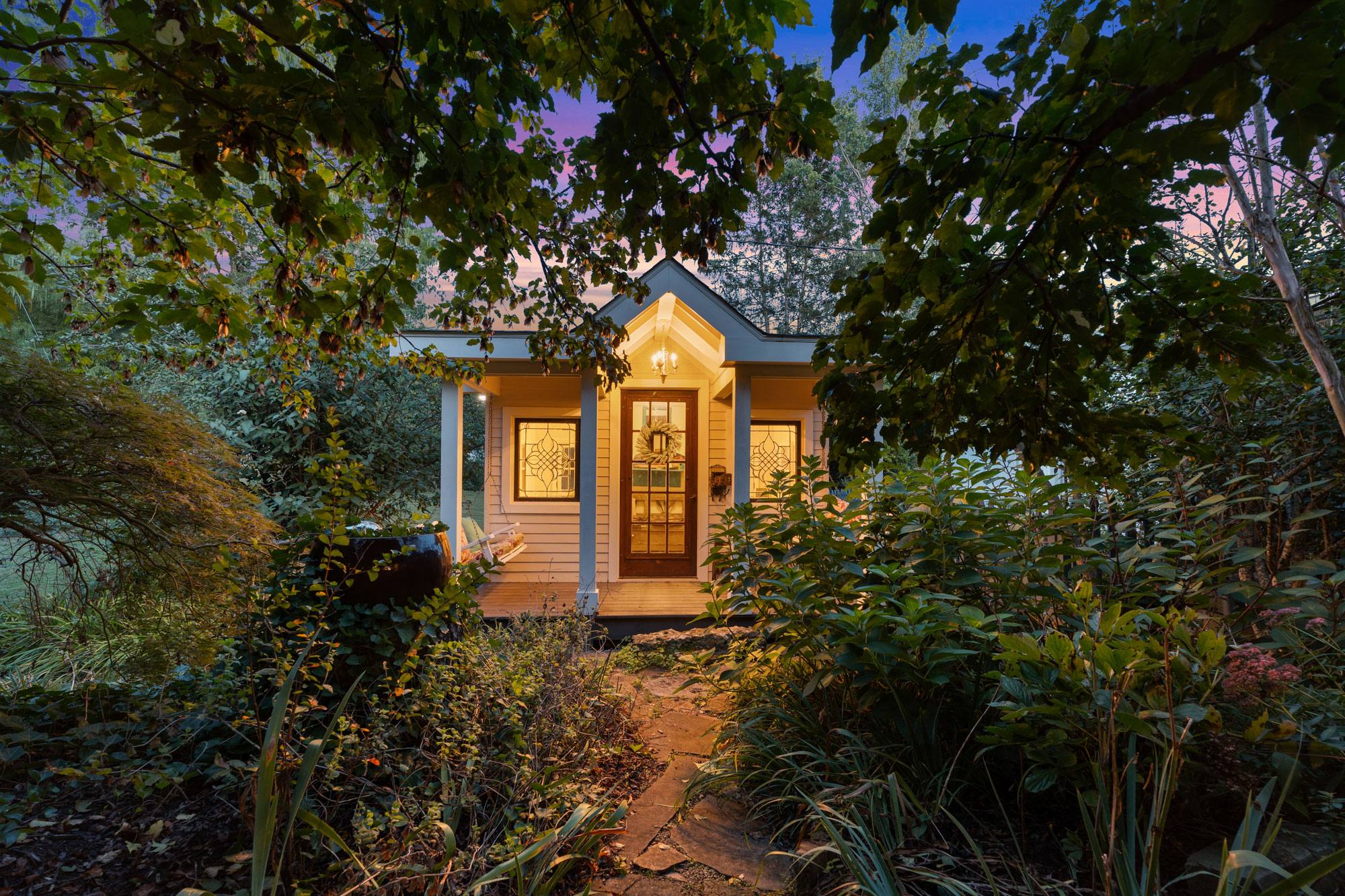 Cottage entrance at dusk, Middle Tennessee property